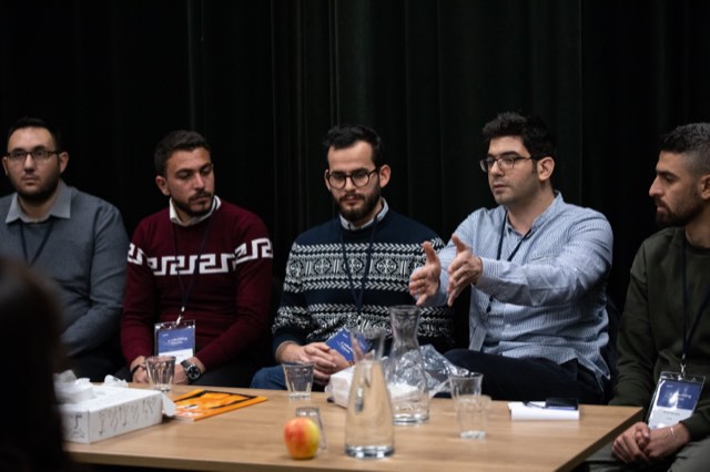 A SPARK refugee-entrepreneur session — the network the bilingual e-commerce curriculum was designed for