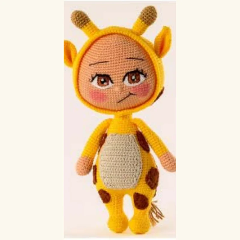 ⁨A crocheted doll redesigned as a giraffe, with embroidered eyes and a trend-led palette⁩